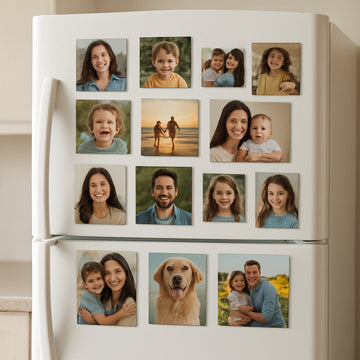 A bright kitchen fridge covered with a collage of magnetic photo tiles in various sizes and finishes, showcasing both glossy and matte surfaces. Alt: magnetic photo tiles collage on fridge